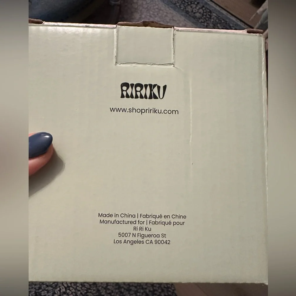 New in box Ririku resin coaster set of 4